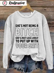 she's not being a bitch sweatshirt
