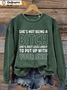 she's not being a bitch sweatshirt